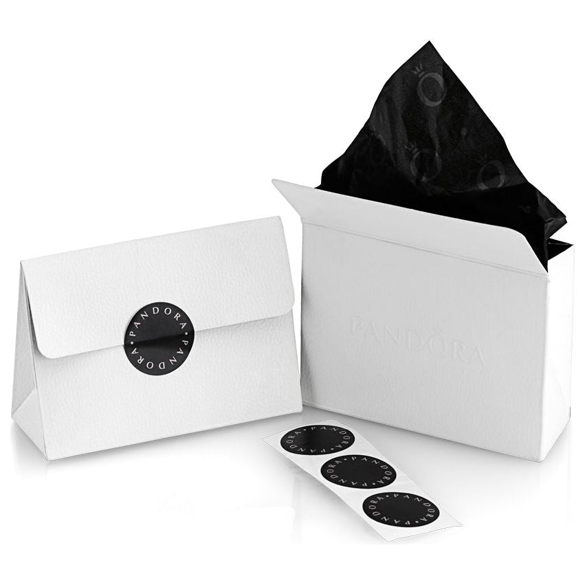 PANDORA jewelry packaging with branded tissue paper, envelope, and stickers, ideal for gifting iconic PANDORA pieces.