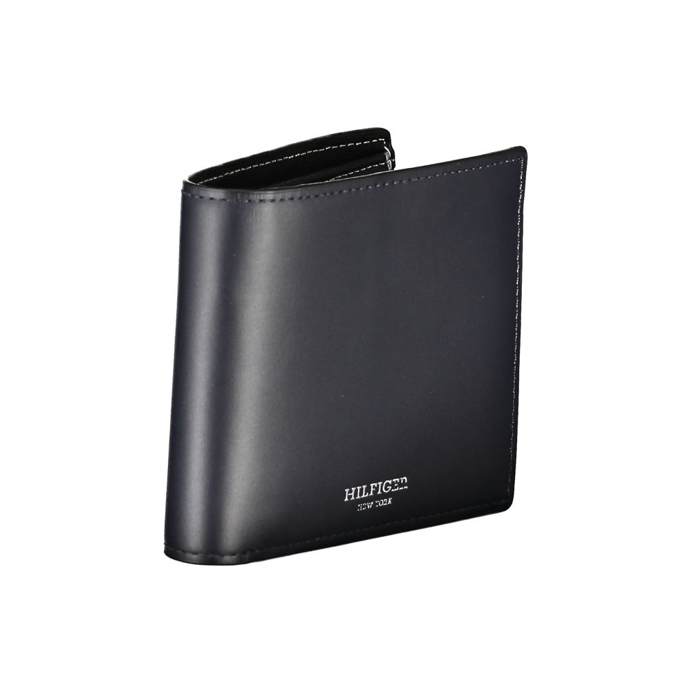 Tommy Hilfiger Blue Leather Wallet with two compartments, coin purse, card holder, contrast details, and logo.