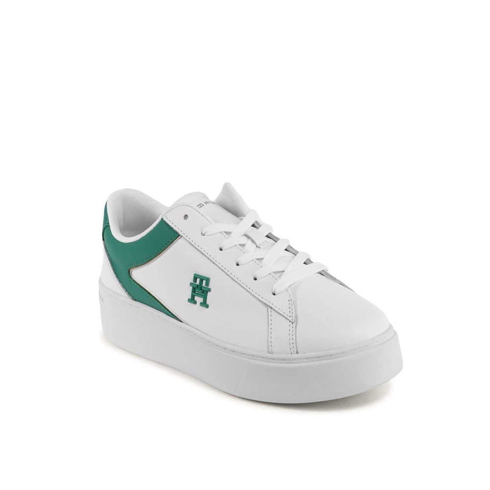 Tommy Hilfiger White Leather Low Top Sneakers, women's style, made in Vietnam, featuring a green emblem and trim on the side.