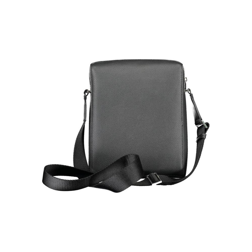 Calvin Klein black shoulder bag with adjustable strap, eco-friendly luxury design, and logo detail. Perfect for modern style and utility.