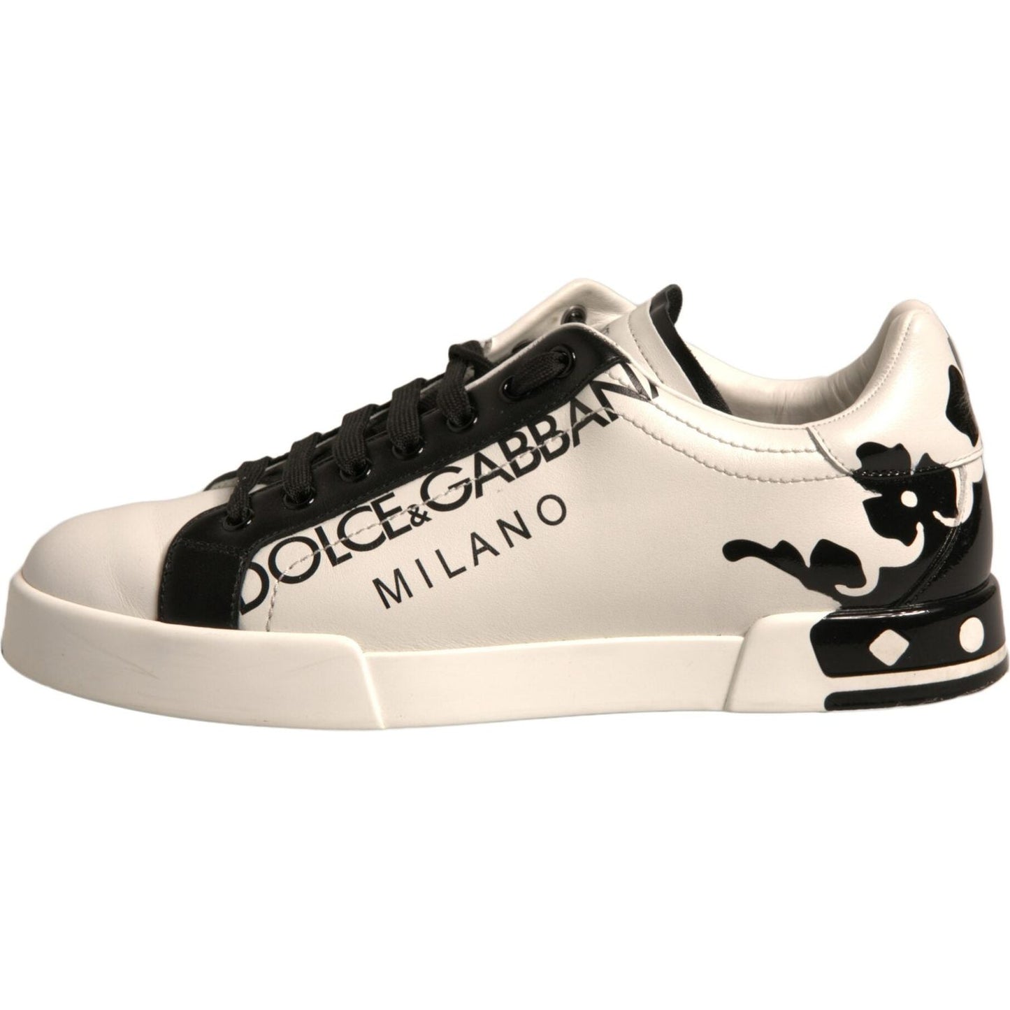 Dolce & Gabbana white black leather sneakers with crown detail, Milano logo, and lace-up closure. 100% calf leather, made in Italy.