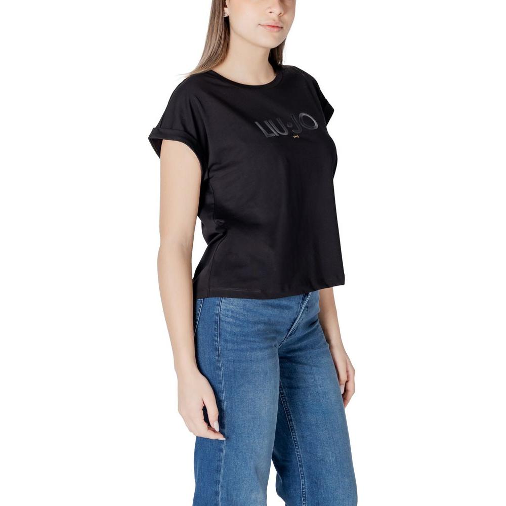 Woman wearing Liu Jo black cotton t-shirt with short sleeves and jeans, showcasing a casual yet stylish outfit.