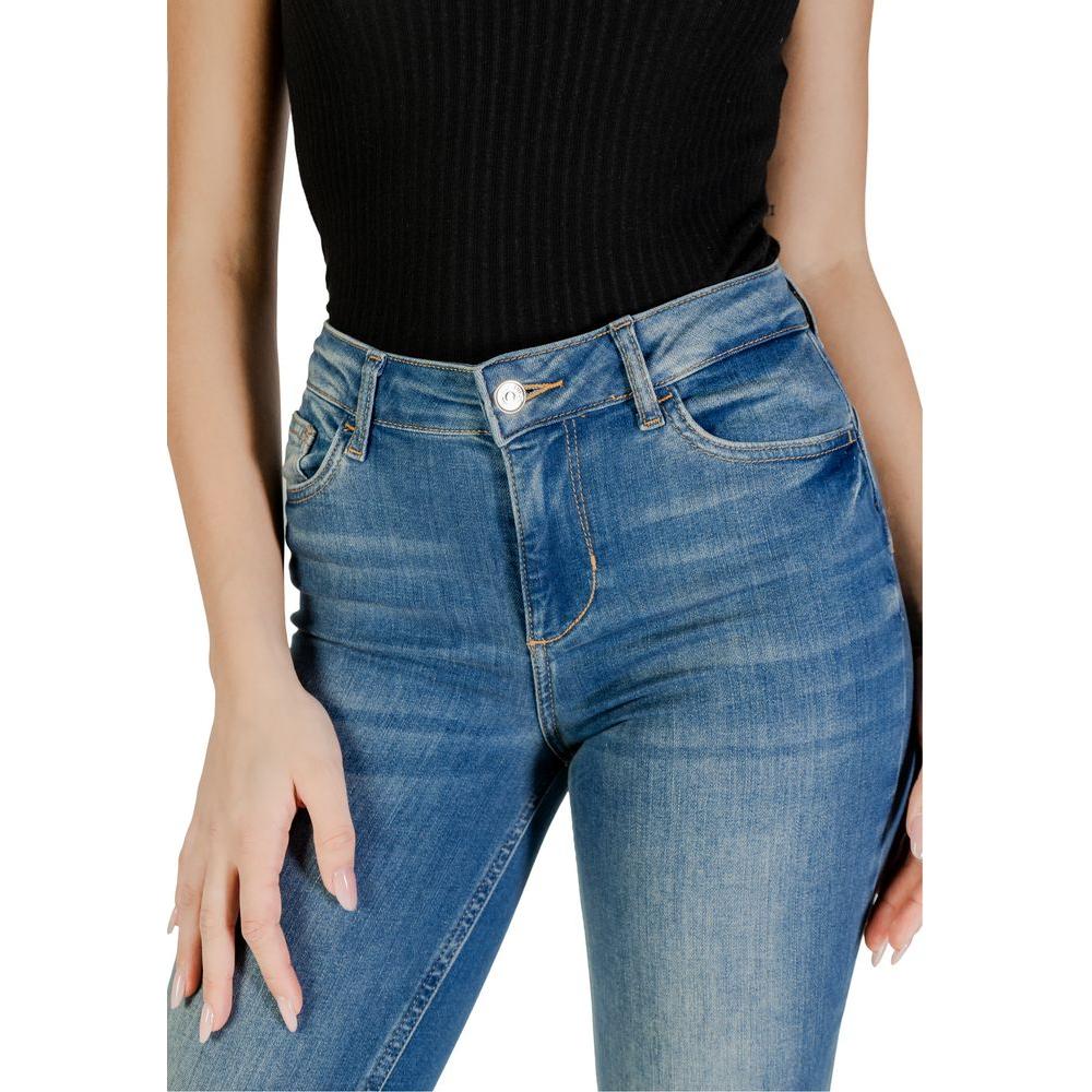 Woman wearing Liu Jo blue bootcut jeans with high waist, accentuating the silhouette and stylish flared design for a modern look.