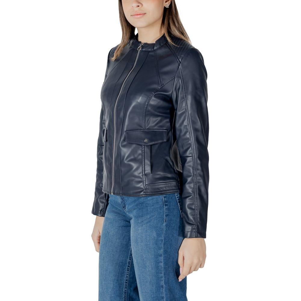 Woman wearing a Street One black polyester jacket, featuring a sleek design, part of the women's jackets collection.