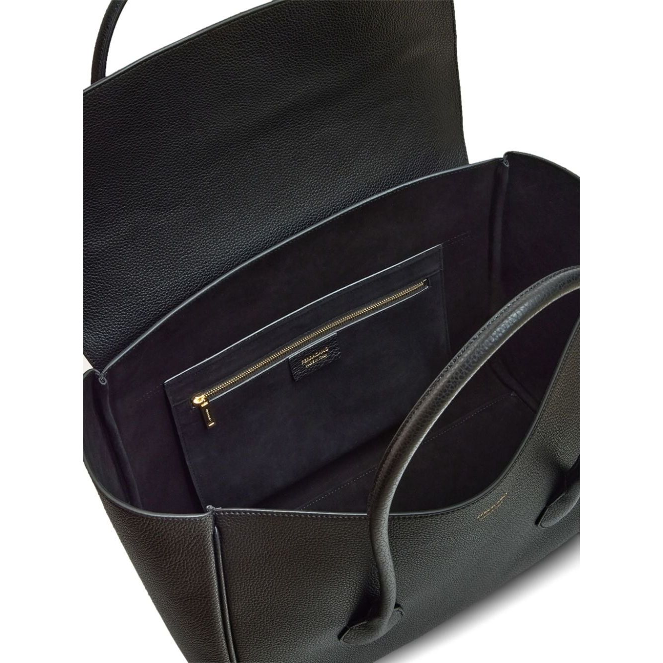 Front view with bag zipped and handles upright.