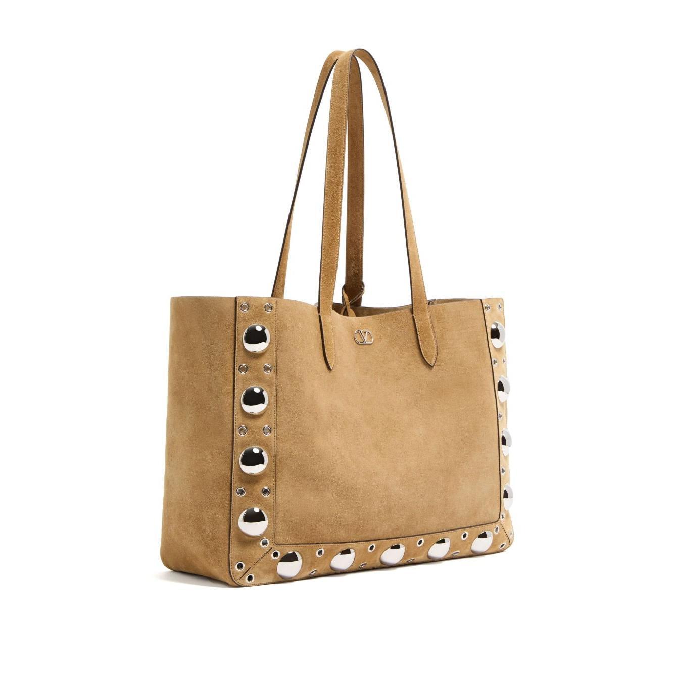Front view with bag zipped and handles upright.