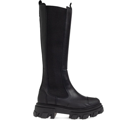 GANNI Boots Black with chunky lug sole, faux-leather upper, elastic side panels, double pull-tab, and round toe Chelsea design.