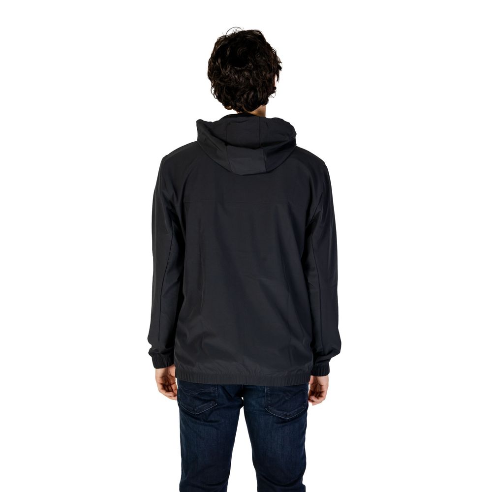 Front view with bag zipped and handles upright.