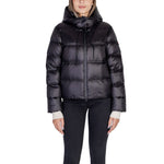Woman wearing Peuterey Black Polyamide Jackets & Coat with adjustable hood and quilted design.