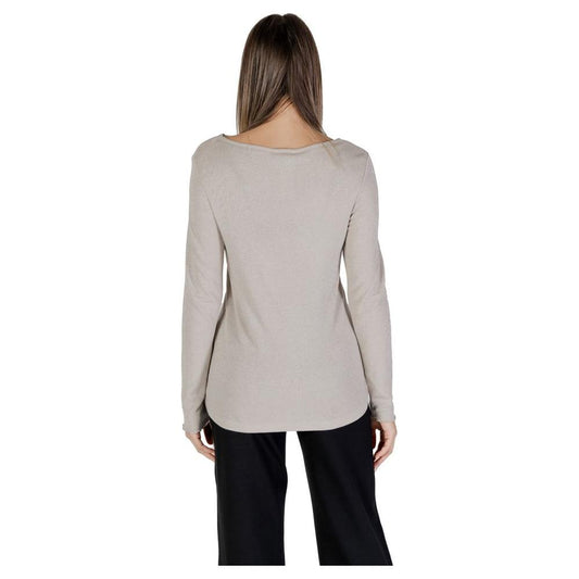 Back view of a woman wearing a Street One beige viscose top, part of the women's Fall/Winter collection, featuring long sleeves.