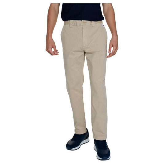 Men's Tommy Hilfiger gold recycled cotton jeans, fall/winter collection, 96% cotton, 4% elastane, sustainable men's pants.