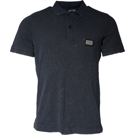 Dolce & Gabbana dark blue collared polo t-shirt with logo, short sleeves, and button closure, made of 100% cotton. Regular fit, minor defect.