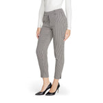 Model wearing Only Black Polyester Pant, women's fall/winter collection, in polyester, viscose, and elastane blend, stylish office wear.