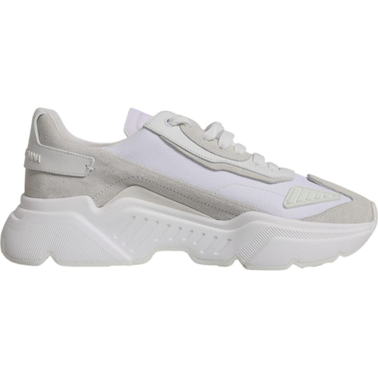 Dolce & Gabbana white leather Daymaster low top sneaker with rubber sole and lace-up closure, featuring logo details, side view.
