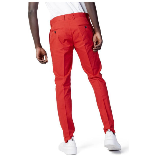 Back view of a man wearing Antony Morato red cotton slim fit trousers, showcasing stylish contemporary fashion.