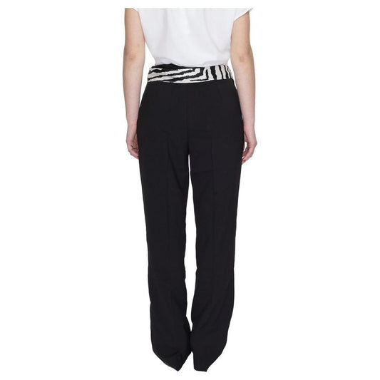 Women's bootcut black polyester pants with zebra print waistband, spring/summer collection, rear view