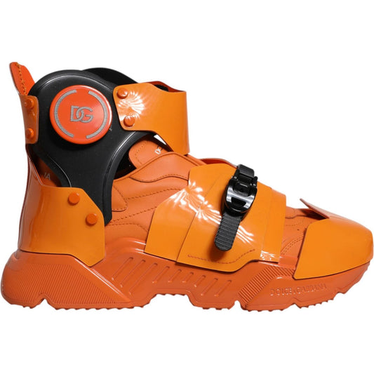 Dolce & Gabbana orange multi-panel chunky high top sneakers with buckle closure and logo patch, featuring a ridged rubber sole.