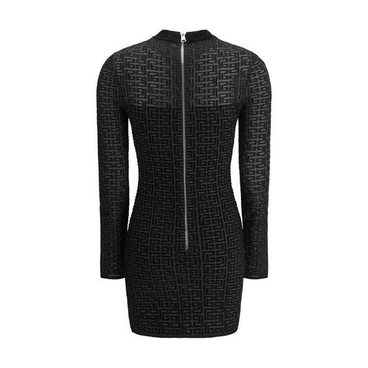 Balmain Knit Mini Dress with long sleeves, back zipper, and bold logo pattern for a modern, elegant silhouette.