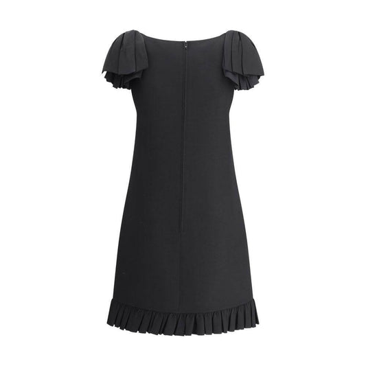 Valentino Mini Dress with bows, black, sleeveless, boat neckline, ruffled hem, decorative shoulder bows, back zipper closure.
