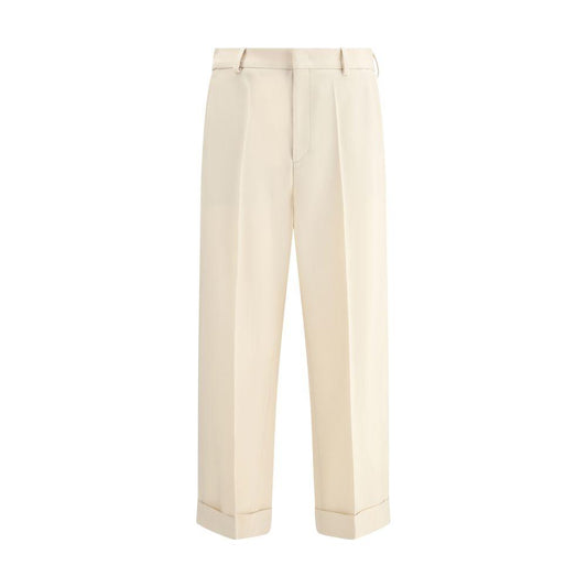Valentino wide-leg virgin wool pants with front zipper, hook-and-eye closure, side welt pockets, back slit pockets, and turned-up hem.