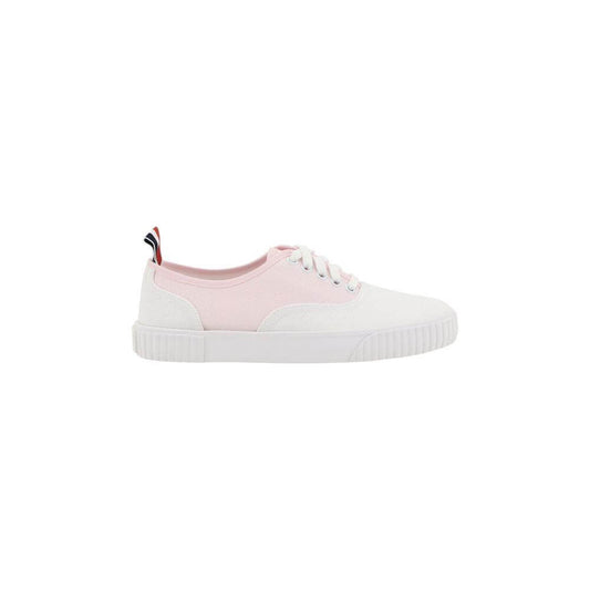 Thom Browne cotton sneakers with paneled design, lace-up front, pull tab, and flat rubber sole, featuring branded insole.