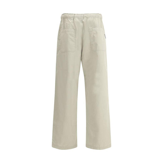 Palm Angels cotton waist pants with elastic waistband, wide-leg style, and front pockets, featuring iconic monogram detailing.