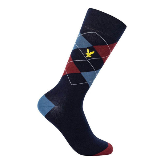 Argyle patterned sock with navy, red, and blue design, featuring a yellow logo emblem.