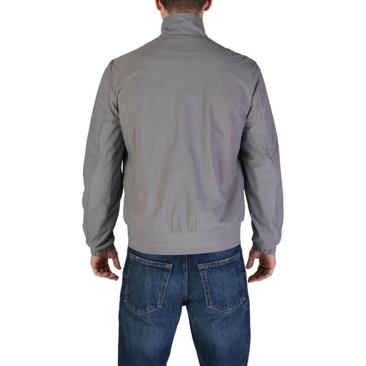 Back view of a men's gray Refrigiwear jacket, 78% polyamide and 22% spandex, part of the fall/winter collection.