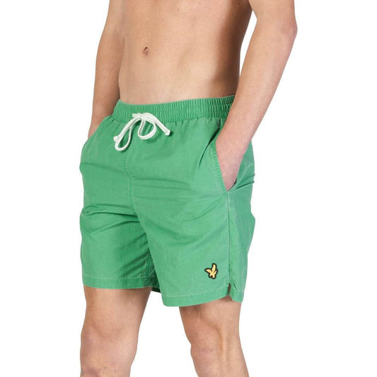 Lyle & Scott men's green nylon swimwear, Fall/Winter collection, featuring elastic waistband and drawstring.