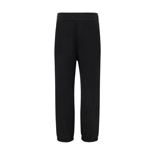 Black Fendi sweatpants with elasticated waistband, hem, and iconic logo detail for a stylish and comfortable urban look.