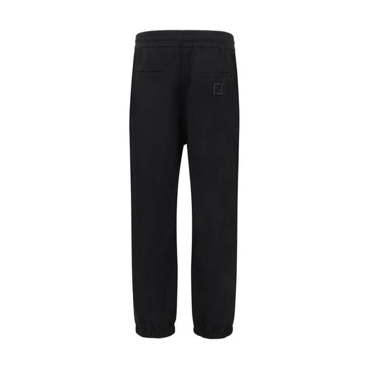 Fendi sweatpants with elastic waistband, elasticized hems, and back welt pockets. Features the iconic logo stitched on back for stylish detail.