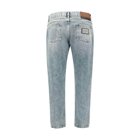 Back view of Dolce & Gabbana worn-effect jeans with five-pocket design and belt loops, perfect for a casual-chic style.