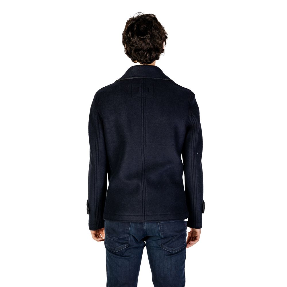 Front view with bag zipped and handles upright.