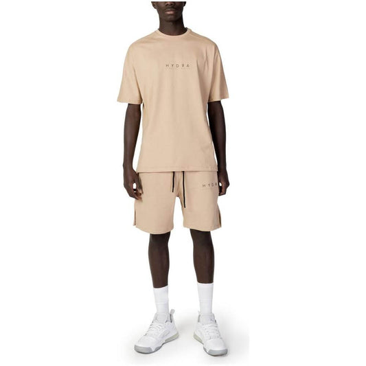 Men's beige cotton sweatsuit by Hydra Clothing, ideal for spring/summer. Featuring a short-sleeve shirt and shorts. 100% cotton material.