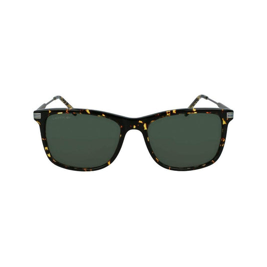 Front view of stylish tortoiseshell sunglasses with dark lenses