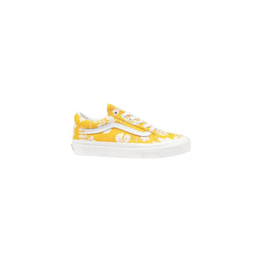 Vans UA Old Skool yellow fabric sneakers with floral pattern, showcasing classic side stripe and low silhouette for casual style.