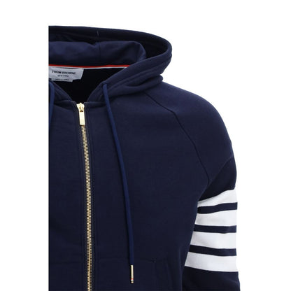 Thom Browne Blue Cotton Sweatshirt with zipper, drawstring hood, white sleeve bands, logo patch, and ribbed hem and cuffs