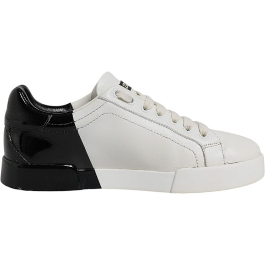 Dolce & Gabbana Portofino men's sneakers in white and black leather with logo detail, lace-up closure, and rubber sole.