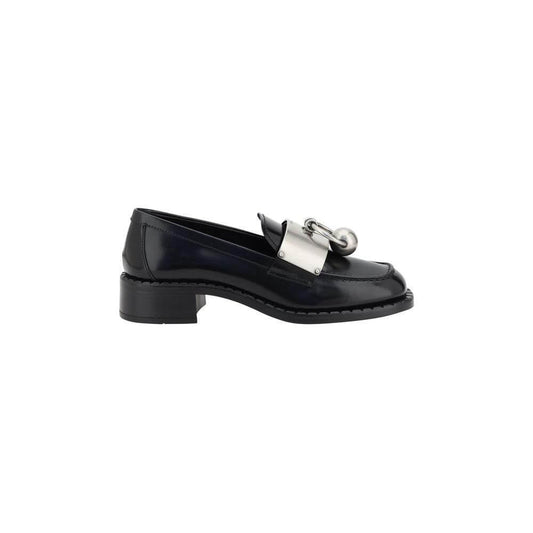 Prada leather women's loafers with block heel, squared toe, and logo-embossed plaque, offering a sophisticated, timeless style.