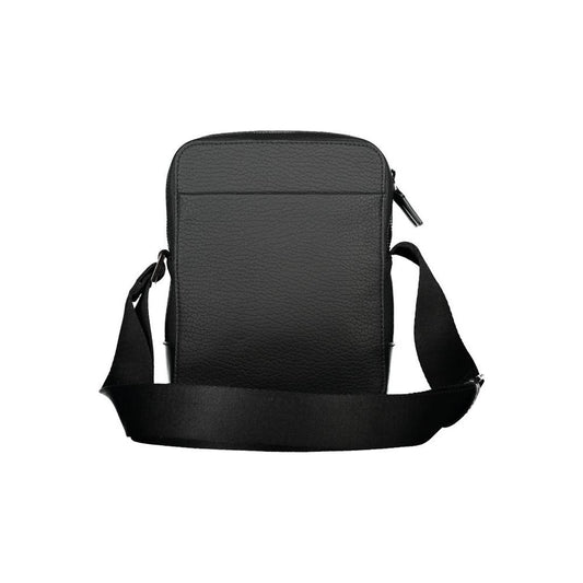 Calvin Klein sleek black shoulder bag with adjustable strap and contrasting details for men, featuring a zip closure and external pocket.