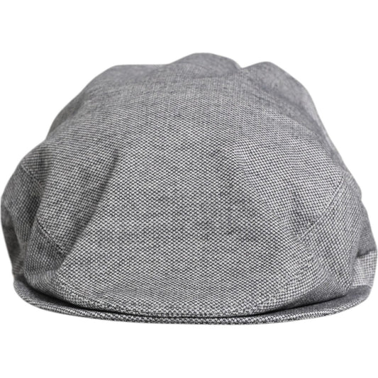 Dolce & Gabbana gray cotton newsboy cap with logo detail, made in Italy. Perfect men’s cabbie hat for style and comfort.