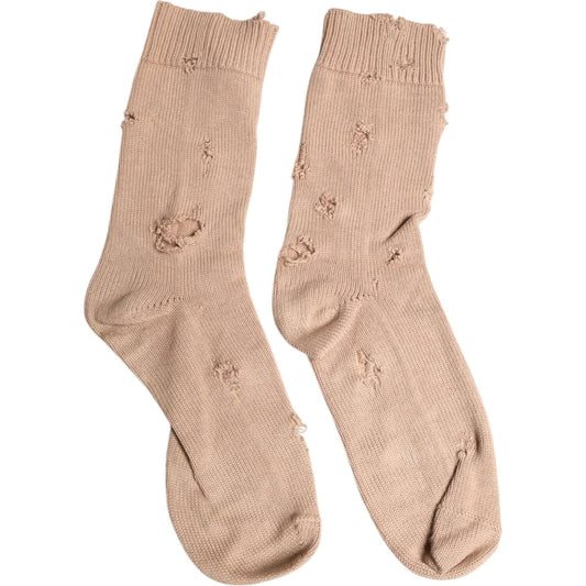 Dolce & Gabbana beige solid stretch mid calf men's socks, showcasing luxury Italian craftsmanship with subtle logo details.