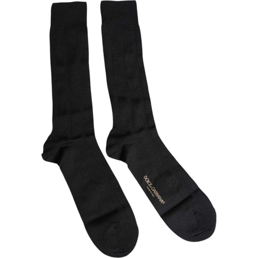 Dolce & Gabbana black stretch mid calf men's socks with logo detail, made in Italy, displayed side by side on a white background.
