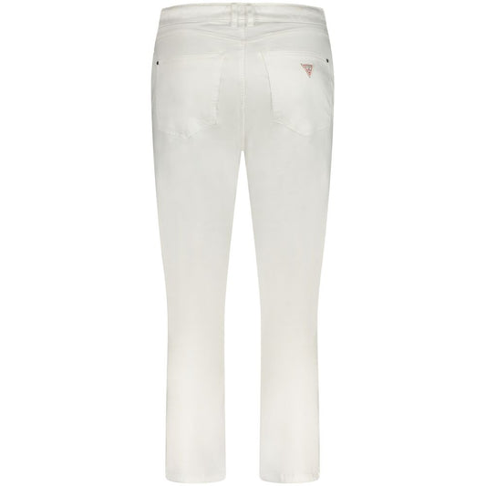 Back view of Guess Jeans white lyocell women’s jeans with five-pocket design and logo detailing, showcasing stretchy skinny fit fashion.