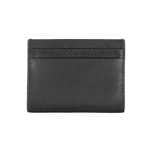 Calvin Klein elegant black leather card holder with central pocket and logo, perfect for minimalists seeking style and convenience.