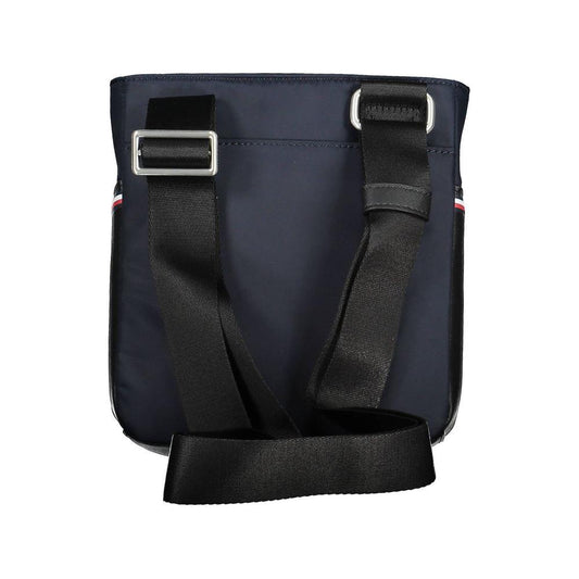 Tommy Hilfiger blue polyester men's shoulder bag with adjustable strap and external pockets for stylish functionality.
