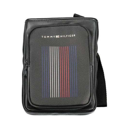 Tommy Hilfiger black polyethylene shoulder bag with adjustable strap, external and internal pockets, contrasting zip details, logo print.