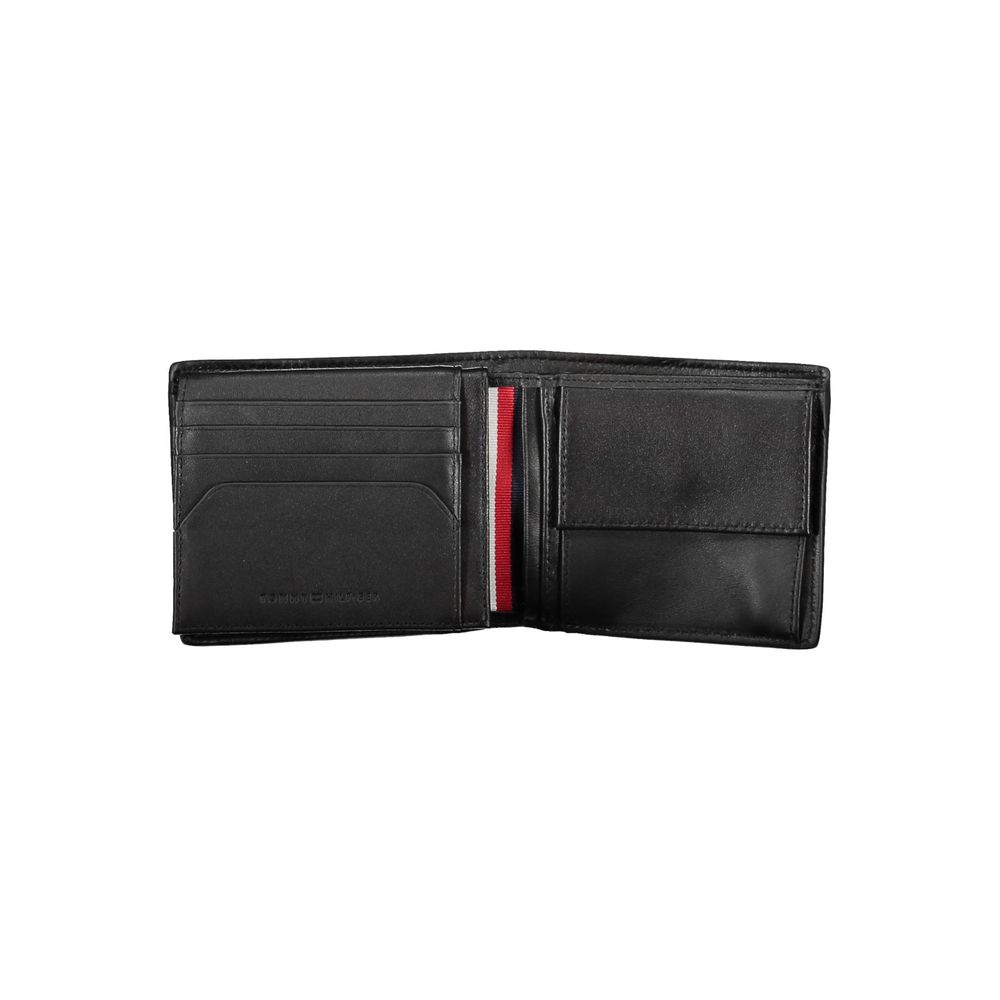 Tommy Hilfiger Black Leather Men Wallet with dual compartments and coin purse, showcasing sleek design and signature logo.