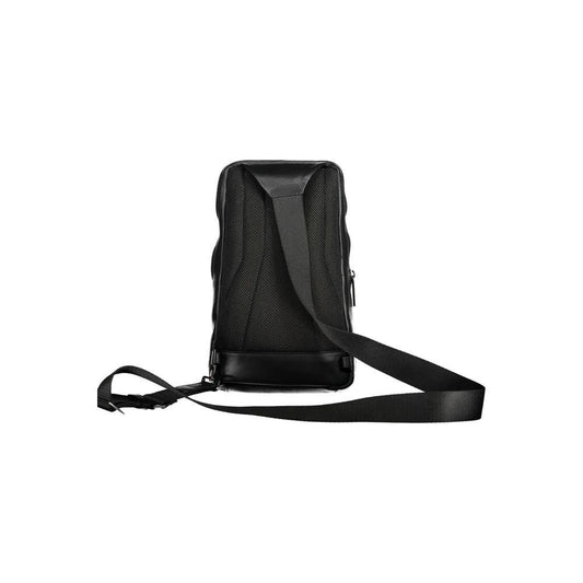 Back view of Piquadro black leather men's shoulder bag with adjustable strap, showcasing its slim profile and craftsmanship.