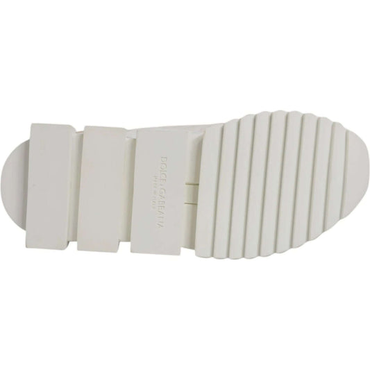 Sole view of Dolce & Gabbana Sorrento white sneakers with branded rubber cleated design.